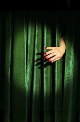 Hand and Green Curtain
